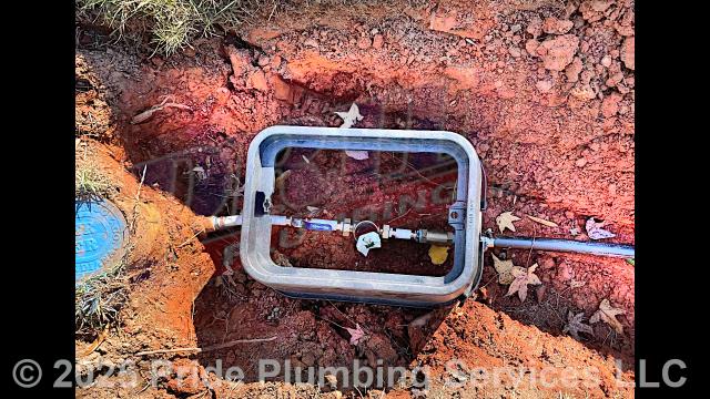 Pride Plumbing came out and: 1) trenched a ditch from an existing water meter to the house to expose and remove the outside main water supply line; 2) installed a new 1-inch black roll and PEX outside main water supply line from the water meter to the house along with installing tracer wire; 3) connected the new water line to an existing water line connection under the house and installed a ball valve main water cut off in the crawlspace and installed a new thermal expansion tank; 4) installed a new pressure reducing valve (PRV), ball water shutoff valve, and check valve at the water meter in the meter box; 5) tested the new water line for leaks and working order; and 6) backfilled and tamped the ditch after the work was completed and approved by Richmond County’s Inspection Department.