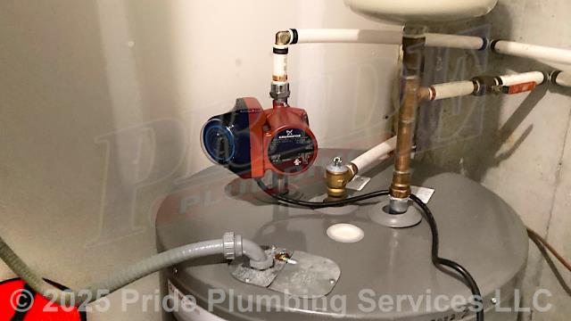 Pride Plumbing came out and used PEX piping and fittings to install a Grundfos Comfort System thermostatically controlled comfort valve (with a stainless-steel circulator and timer) at a Rheem water heater.