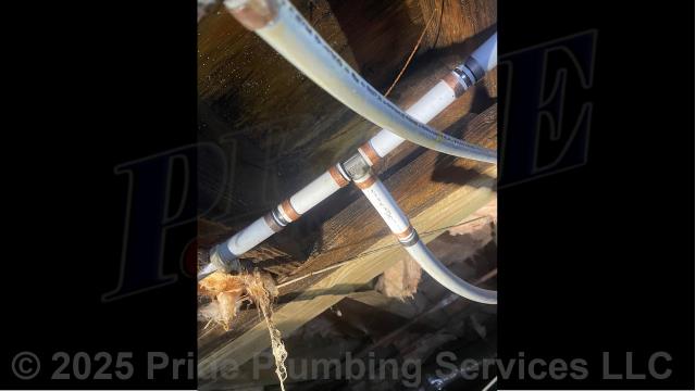 Pride Plumbing was called out for a water leak underneath the home. We found a leak on a polybutylene water supply line tee - well water had deteriorated its brass fittings. After shutting off the water, we cut out the leaking fitting and a short section of pipe and repaired them with new PEX piping and fittings. We then cut the water back on, drained out any debris at an outside hose bib spigot, and tested for leaks with no further issues. We also provided a cost estimate to 1) repipe and replace the water supply lines under the house in the crawlspace, going to the fixtures in the kitchen (sink, dishwasher, and ice maker), at the washing machine, the water heater, and in one bathroom, with new PEX piping and fittings; and 2) repipe and replace the drain lines in the crawlspace, going to all the fixtures in the home (kitchen, one bathroom, and a washing machine), with new PVC piping; installing new fittings and supports under the house for each fixture.