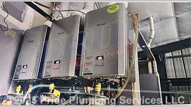 Pride Plumbing came out and installed three new Rinnai 199K BTU tankless water heaters. This included: 1) installing the new tankless units along with Jomar service valves, PEX and stainless steel water lines to the units’ water connections, black roll gas supply lines, gas regulators, recirculating kits, and condensation and intake lines; 2) cutting, capping, and rerouting the home’s hot and cold water supply lines over to the location of the new water heaters; 3) installing new gas lines over to the units’ location along with drip legs and gas shutoff valves; 4) wiring up the units; 5) ensuring that they were properly vented; and 6) lighting and programming the units.