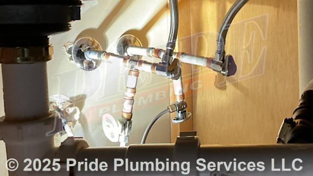 Pride Plumbing came out and replaced three water supply stops underneath a kitchen sink (the hot and cold stops for the faucet, and one for a refrigerator ice maker) along with short sections of their polybutylene piping coming in through the wall and one braided stainless-steel water supply line. We tested for leaks and there were no issues. We also provided a cost estimate to repipe and replace the water supply lines under the house in the crawlspace, going to the fixtures in the kitchen (sink faucet, dishwasher, and ice maker), one bathroom (sink, toilet, and bathtub/shower), the washing machine (installing a new plastic washer box and hot and cold hose bibs or boiler drains), and the water heater, with new PEX piping and fittings (installing new 1/4 turn water shut-off valves on each fixture inside the house along with new above-floor stainless steel braided water supply lines) and replace two outside hose bib spigots with new Woodford frost-free models.