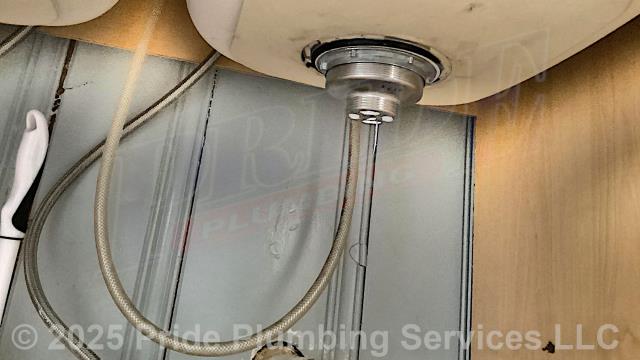 Pride Plumbing was called out for a water leak underneath a kitchen sink. Our inspection found that one of the sink's basket strainers was leaking. We removed and replaced the basket strainer and flange tailpiece, tested for leaks, and the issue was corrected. The kitchen sink's drain line was also clogged, so we used a sewer machine and cleared the blockage.