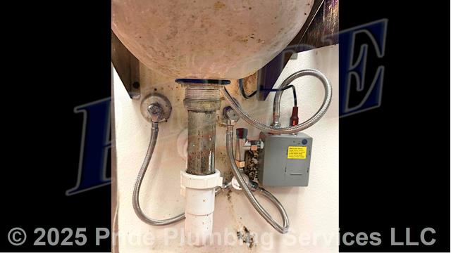 Pride Plumbing came out and removed and replaced a non-working electronic touchless handwash sink faucet with a new T&S Brass EC-3132 electronic touchless model. This included removing the old faucet, mounting the new faucet, replacing the hot and cold above-floor braided stainless steel water supply lines underneath the sink, and connecting the faucet's electronic control module.