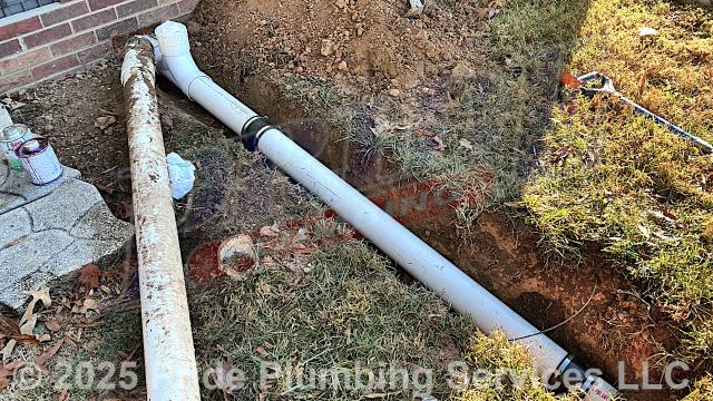 Pride Plumbing came out, dug down to and uncovered the outside main sewer septic drain line, cut into it, and installed a new two-way PVC cleanout with a cap (connecting it to the existing outside main sewer septic drain line with new PVC fittings and/or Fernco couplings).