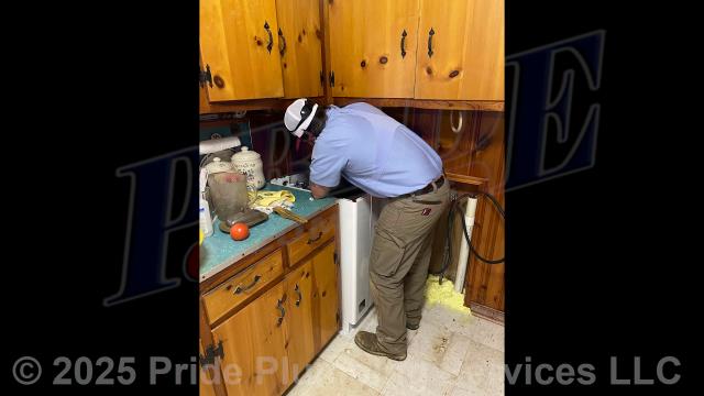 Pride Plumbing came out and replaced a leaking 40-gallon electric Rheem 88H40D tabletop lowboy water heater with a new 40-gallon electric A.O. Smith tabletop lowboy model. First, we removed and disposed of the old water heater, disconnecting its electrical connections and inlet and outlet water lines. Then we installed the new water heater, new ball water shut-off valves, new PEX and stainless-steel water supply lines to the water heater connectors, a new brass drain valve, and wired up the electrical connections to the new water heater (adding a Romex connector). Finally, we bled the air out of the water lines, ensured that the unit’s temperature and pressure (T&P) relief valve was properly vented, and set the unit to its appropriate operating temperature.