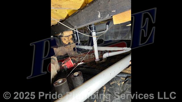 Pride Plumbing came out and repiped and replaced the drain lines under the house in the crawlspace, going to a) the fixtures in the kitchen (sink and dishwasher) and two bathrooms (sinks, toilets, and bathtubs/showers - replacing the toilet bowl flanges and wax ring gaskets, the bathtub/shower drains, and the P-traps underneath all the sinks, and the bathtub/shower's waste and overflow); and b) the washing machine - installing new PVC piping, fittings and supports under the house and up through the flooring for each fixture and air admittance valves inside the home where needed. We also dug down near the home's foundation and installed an outside PVC cleanout.