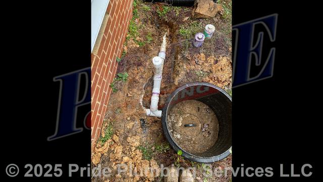 Pride Plumbing came out and repiped and replaced the drain lines under the house in the crawlspace, going to a) the fixtures in the kitchen (sink and dishwasher) and two bathrooms (sinks, toilets, and bathtubs/showers - replacing the toilet bowl flanges and wax ring gaskets, the bathtub/shower drains, and the P-traps underneath all the sinks, and the bathtub/shower's waste and overflow); and b) the washing machine - installing new PVC piping, fittings and supports under the house and up through the flooring for each fixture and air admittance valves inside the home where needed. We also dug down near the home's foundation and installed an outside PVC cleanout.