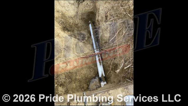 Winston-Salem, NC - Pride Plumbing came out and performed the following work: 1) used an excavator to trench a ditch from the apartment to the town sewer tap to expose and remove the outside main sewer septic drain line; 2) installed a new 6-inch PVC sewer drain line (connecting it to the town's sewer tap at the edge of the property and the main drain line underneath the apartment) along with proper cleanouts and fittings per code; 3) installed tracer wire in the ditch along with the new sewer drain line; and 4) backfilled, tamped, and spread grass seed and straw after the work had been inspected and approved by Forsyth County's Inspection Department.