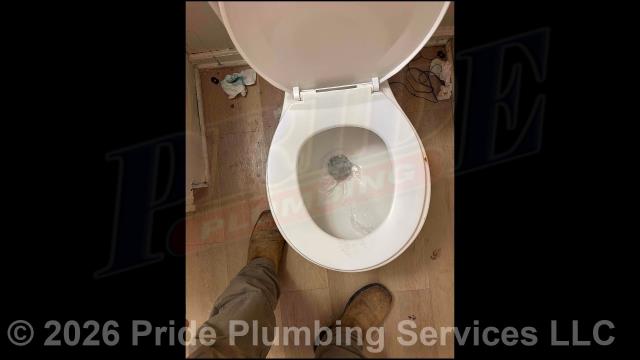 Pride Plumbing came out and cut a section out of the main drain stack and started to repair a section of pipe. Upon trying to make the repair, we noticed that the pipe was loose lower down inside the wall. We cut two access holes in the drywall to access that section of pipe. We found a Fernco coupling that was connected but not tight and that the pipe coming down from the main drain stack was too short. We removed the Fernco coupling, cut and replaced the short section of pipe with a longer piece of PVC pipe, and used two Fernco couplings to reconnect it. We then went back up and made the repair on the main drain stack. We also pulled and reset a toilet on a second-floor guest bathroom and set a second toilet in the master bathroom.