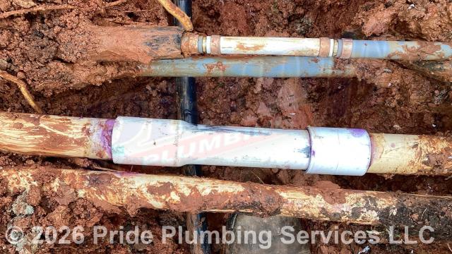 Pride Plumbing was called out for a water leak in the yard - a company was digging with a backhoe and broke a polybutylene water pipe, a PVC water pipe, and PVC drainpipe. We cut out the damaged sections of all three pipes and repaired the polybutylene pipe with new PEX piping and fittings, the PVC water pipe with new PVC piping and fittings, and the PVC drainpipe with new PVC piping and fittings. We turned the water back on and tested for leaks with no further issues. We also provided a cost estimate to trench a ditch from the water meter to the home and replace the main outside water supply line with new black roll and PEX piping and fittings along with installing a new pressure reducing valve (PRV) and ball water shutoff valve at the water meter.
