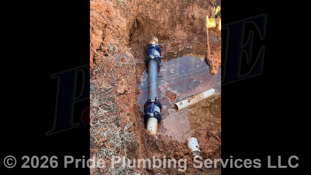 Pride Plumbing was called out for a water leak in the yard - a boring machine had hit a lift station's PVC drainpipe and broke it. We dug down, cut out the damaged section of pipe, installed new Schedule 80 PVC piping and two 4-inch HyMax repair couplings, cut the lift station on and let it run for 15 minutes, tested for leaks and proper drainage with no issues, backfilled and tamped the area we dug out, and spread grass seed and hay over the area.