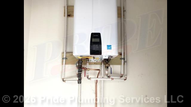 Pride Plumbing came out and replaced two 50-gallon American PowerFlex PVG62-50T63-3PHV propane gas water heaters with a new Navien 240A tankless model with a NAVICIRC recirculation pump. This included removing and disposing of the old tank water heaters after disconnecting their electrical connections, vent lines, and gas and inlet and outlet water lines; and installing the new tankless water heater along with making its appropriate electrical, gas, and water connections; ensuring that the unit was properly vented and setting it to its appropriate operating temperature. We also capped off the unused gas line underneath the home and converted the tankless to propane. We flushed debris out of the water line and tested for leaks and proper operation with no issues.