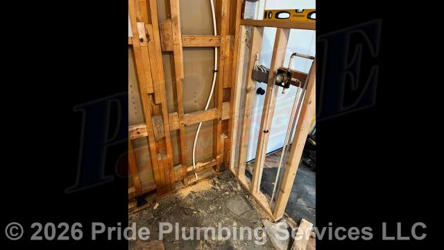 Pride Plumbing came out and 1) demoed a kitchen sink, dishwasher, bathroom sink, toilet, and shower; 2) in the kitchen, installed a kitchen sink and faucet, dishwasher, refrigerator ice maker, and gas supply line to a gas stove; 3) in the bathroom, installed a sink and faucet, toilet, and tile shower (including the shower valve, valve handle(s), showerhead, and drain); 4) made all the water and drain connections underneath the home; and 5) installed an Honest Water Filter Company Silver Plus whole-house water filtration system (this includes installing the unit's manifold with a Defender pre-filter and two 5-micron filters along with the bypass system, rinse valve and pressure gauge; mounting the water filter base, running and connecting new PEX piping inlet and outlet water supply lines to the base and the existing water lines underneath the home and adding ball water shutoff valves; installing the water filter housing, and testing for leaks and proper operation.