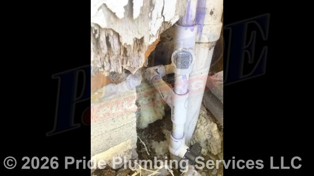 Pride Plumbing was called out for a water leak at an outbuilding. Our inspection found that the pipes had frozen and burst due to not being insulated. We cut out and replaced the cracked section of pipe with new PVC piping and fittings (adding a new PVC tee and 90-degree elbow). We then insulated the exposed pipes.