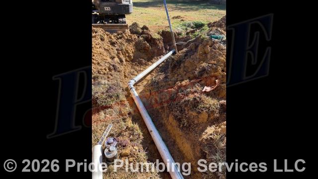 Pride Plumbing came out and performed the following work: 1) trenched a ditch from the house to the septic tank to expose and remove the outside main sewer septic drain line; 2) installed a new 4-inch PVC sewer drain line (connecting it to the main drain line under the home) along with proper cleanouts and fittings per code; 3) installed tracer wire in the ditch along with the new sewer drain line; and 4) sealed the septic tank penetration and backfilled, tamped, and spread grass seed and straw after the work had been completed.