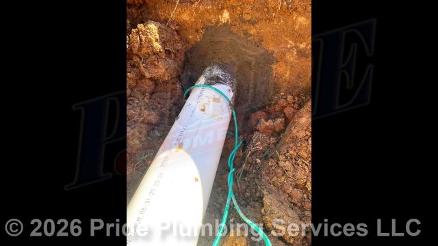 Pride Plumbing came out and performed the following work: 1) trenched a ditch from the house to the septic tank to expose and remove the outside main sewer septic drain line; 2) installed a new 4-inch PVC sewer drain line (connecting it to the main drain line under the home) along with proper cleanouts and fittings per code; 3) installed tracer wire in the ditch along with the new sewer drain line; and 4) sealed the septic tank penetration and backfilled, tamped, and spread grass seed and straw after the work had been completed.