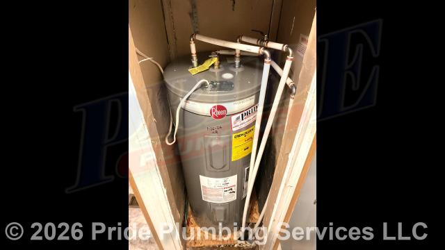 Pride Plumbing came out and replaced a leaking 40-gallon electric Rheem water heater with a new 40-gallon electric Rheem PROE40-M2-RH95 model. First, after disconnecting its electrical connections and inlet and outlet water lines, we removed and disposed of the old water heater. Then we installed the new water heater, ball water shut-off valves, PEX and stainless-steel water supply lines to the water heater connectors, a brass drain valve, and wired up the electrical connections to the new water heater (adding a Romex connector). Finally, we bled the air out of the water lines, ensured that the unit’s temperature and pressure (T&P) relief valve was properly vented, and set the unit to its appropriate operating temperature.