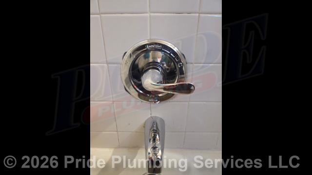 Pride Plumbing came out and replaced a leaking single-handle bathtub/shower faucet valve with a new single-handle Delta model with chrome trim (shower head, faucet valve handle and cover, downspout diverter, and overflow and drain covers). This included cutting an access in the shower wall and replacing the valve along with short sections of its hot- and cold-water supply lines with new PEX piping and fittings.
