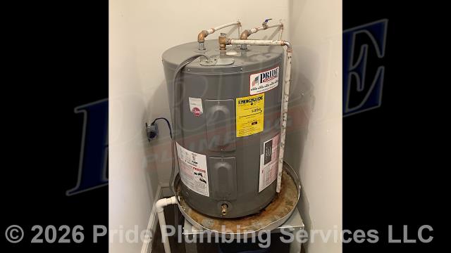 Pride Plumbing came out and replaced a leaking 38-gallon electric Rheem lowboy water heater with a new 38-gallon electric Rheem PROE38-S2-RH95-B lowboy model. This included removing and disposing of the old water heater; installing water heater pads, the new water heater, ball water shut-off valves, PEX and stainless steel water supply lines to the water heater connectors, a brass drain valve, bleeding the air out of the water lines, ensuring that the unit’s temperature and pressure (T&P) relief valve was properly vented, wiring the water heater's electrical connections (adding a Romex connector), and setting the unit to its appropriate operating temperature.