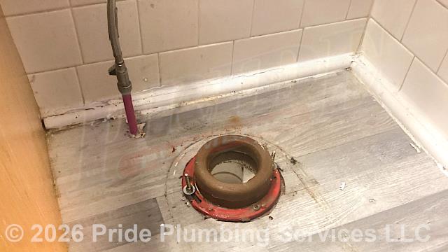 Pride Plumbing was called out for a Crane toilet bowl leaking at its base. We pulled the toilet, cleaned and inspected its flange, replaced its single wax ring gasket with two new Mainline ML11580 models, reset the toilet, replaced its toilet bowl bolts and caps and the toilet tank's above-floor braided stainless steel water supply line. We tested for leaks and proper operation with no issues and caulked around the base of the toilet bowl.