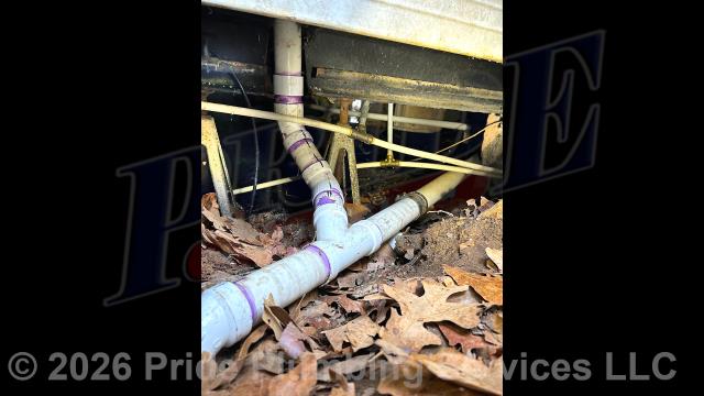 Pride Plumbing was called out for a water leak underneath the home. Our inspection found that the leak was coming from a drainpipe that had two broken fittings. We cut out the leaking section of pipe and replaced it with new PVC piping and fittings, connecting on to the remaining cast-iron piping with a new no-hub coupling. After the repair, we tested the drainpipe for leaks with no further issues. There was also a leak on a shower drain. We took the walk-in shower's drain cover off, tightened the assembly, and stopped the leak. We also provided a cost estimate to repipe and replace the drain lines in the crawlspace, going to all the fixtures in the home (kitchen, one bathroom, and a washing machine), with new PVC piping; installing new fittings and supports under the house for each fixture and air admittance valves inside the home where needed.