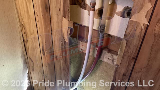 Pride Plumbing was called out for a water leak behind a bathroom wall. After turning off the water and cutting an access hole in the wall, we found a leak on a polybutylene water supply line. We cut out the leaking section of pipe and repaired it with new PEX piping and fittings. We then cut the water back on and tested for leaks with no further issues. We also provided a cost estimate to repipe and replace the water supply and drain lines in the crawlspace, going to all the fixtures in the home (the kitchen, two bathrooms (toilets, sinks, and bathtubs/showers), a washing machine, and a water heater), with new PEX and PVC piping respectively; installing new fittings and supports under the house for each fixture.