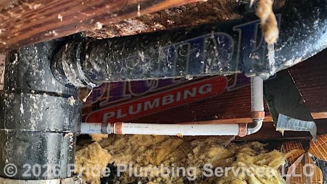 Pride Plumbing was called out for a water leak underneath the home. We found a leak on a polybutylene water supply line. After shutting off the water, we cut out the leaking section of pipe and repaired it with new PEX piping and fittings. We then cut the water back on, drained out any debris at an outside hose bib spigot, and tested for leaks with no further issues. We also provided a cost estimate to repipe and replace the water supply lines under the house in the crawlspace, going to the fixtures in the kitchen (sink faucet, dishwasher, and ice maker), two bathrooms (sinks, toilets, and bathtubs/showers), the washing machine (installing a new plastic washer box and hot and cold hose bibs or boiler drains), and the water heater, with new PEX piping and fittings (installing new 1/4 turn water shut-off valves on each fixture inside the house along with new above-floor stainless steel braided water supply lines) and replace two outside hose bib spigots with new Woodford frost-free model