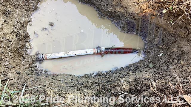 Pride Plumbing was called out for a water leak in the yard. We dug down and found a leak on a section of the black roll outside main water supply line. We cut out the faulty section of pipe, repaired it with new PEX piping and fittings, and flushed debris out of the water line at an outside hose bib spigot. We also provided a cost estimate to trench a ditch from an existing water meter to the home and replace the black roll main outside water supply line with new black roll and PEX piping and fittings along with installing a new pressure reducing valve (PRV) and ball water shutoff valve at the water meter.
