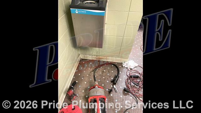 Pride Plumbing was called out for a stoppage on a men’s bathroom SuitMate swimsuit water extraction machine. We disassembled the unit's drain line and used a sewer machine down through the drain. We were able to get a lot of fabric and a bathing suit drawstring out of the drain. We reassembled the drain and tested for proper drainage with no further issues.