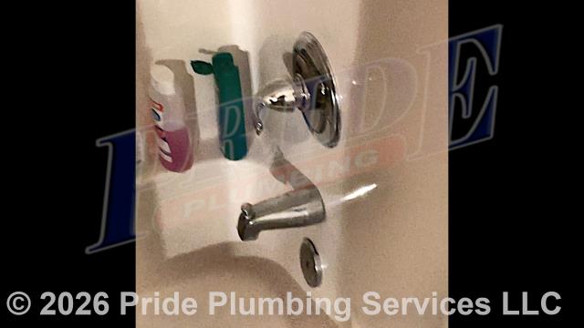 Pride Plumbing came out and replaced a leaking single-handle bathtub/shower faucet valve with a new Delta single-handle model with chrome trim (shower head, faucet valve handle and cover, downspout diverter, and overflow cover). This included cutting an access in the shower wall and replacing the valve along with short sections of its hot- and cold-water supply lines with new PEX piping and fittings.