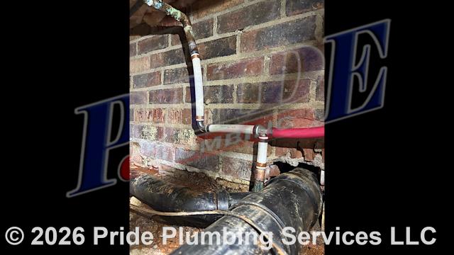 Pride Plumbing was called out for no water pressure in the home and a garage. Our tests and inspection found that there was recent repiping work in which the garage's main water supply line had not been reconnected to the main water line coming from the house. We also found a water leak near the water meter due to an uncapped unused water supply line. First, after shutting off the water, we cut the main line located beneath the house and reattached the garage's water supply line. Next, we dug down to the water leak at the water meter and capped the leaking water line. We then cut the water back on and tested for leaks and proper water pressure with no issues.