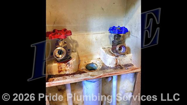 Pride Plumbing was called out for a water leak behind a washing machine. Our inspection found that one of the washer’s boiler drains was leaking. We removed and replaced the hot and cold boiler drains with new Prier 526.42LF-R boiler drains (this included installing new PEX hot and cold water supply lines up through the floor and a ProPlus plastic washer box; tying the water supply and drain lines into their respective water and sewer mains under the home).