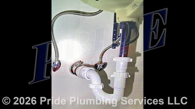 Winston-Salem, NC - Pride Plumbing came out and performed the following work: 1) in a downstairs men’s bathroom, we connected two bathroom sinks' drain assemblies (adding new P-traps, PVC bends, and a slip-joint extension on one of them, and connecting onto the existing drain piping with no-hub couplings) and tested for leaks and proper drainage; and 2) on the second floor, we connected a water line to an AquaHeat unit (adding a bronze reducing 90-degree elbow, brass nipple, and braided stainless-steel lavatory line) and tested for leaks.