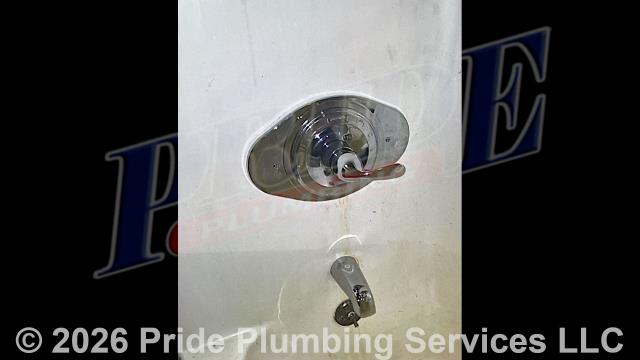 Pride Plumbing was called out for a broken three-handle bathtub/shower valve. After shutting off the water and cutting an access in the wall, replaced bathtub/shower faucet valve with a new Delta R10000-PX rough-in valve; added a Delta Basic 13 chrome trim kit (replacing the shower head, valve cover and handle, overflow cover, and downspout push button diverter); converted the valve's copper above-floor hot and cold water supply lines to PEX piping - tying them into the home's existing copper main water lines; and installed a plastic plumbing access panel over the hole we cut in the wall. We also pulled a Gerber toilet and tightened down its flange to stop it from leaking at the toilet bowl. We reset the toilet and tested for leaks with no further issues.