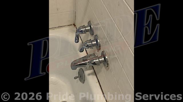 Pride Plumbing was called out for a clogged downstairs bathtub/shower drain, a Kohler toilet that wouldn't flush properly, and a broken upstairs 3-handle bathtub/shower valve handle. First, we removed the downstairs bathtub/shower's stopper and cleaned out a hair clog. Next, we replaced the toilet tank's water fill valve. And lastly, we removed and replaced the upstairs bathtub/shower valve with a new Gerber 3-handle model. We tested all repairs for leaks and proper operation with no further issues.