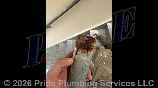 The Pride Plumbing team began by carefully cutting the drywall to access the damaged section of the cast iron drain line. We then removed the compromised section and installed a new PVC drain line, extending it all the way back to the P-trap beneath the sink in the cabinet. After ensuring the new line was securely in place, we tested for leaks and verified proper drainage. We discreetly routed the drain line as part of the repair process. Finally, we cleaned the work area thoroughly to leave everything neat and tidy.