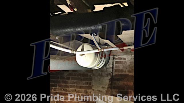 Upon arrival, Pride Plumbing identified several issues causing a lack of hot water in the home. The 40-gallon electric A.O. Smith ENS-40 water heater had caught fire, necessitating immediate attention. Additionally, the expansion tank was waterlogged and improperly strapped, which could lead to further complications. A water leak was also detected from a shut-off valve and a 90-degree fitting. We replaced the faulty water heater with a new 40-gallon electric Bradford White RE340S6-1NCWW model, installed a new expansion tank, and secured it properly. The shut-off valve and fitting were also replaced to stop the leak. After refilling the new heater, we restored power. All systems were functioning correctly, ensuring hot water availability. We also provided a cost estimate for repiping and replacing water supply lines with new PEX piping.