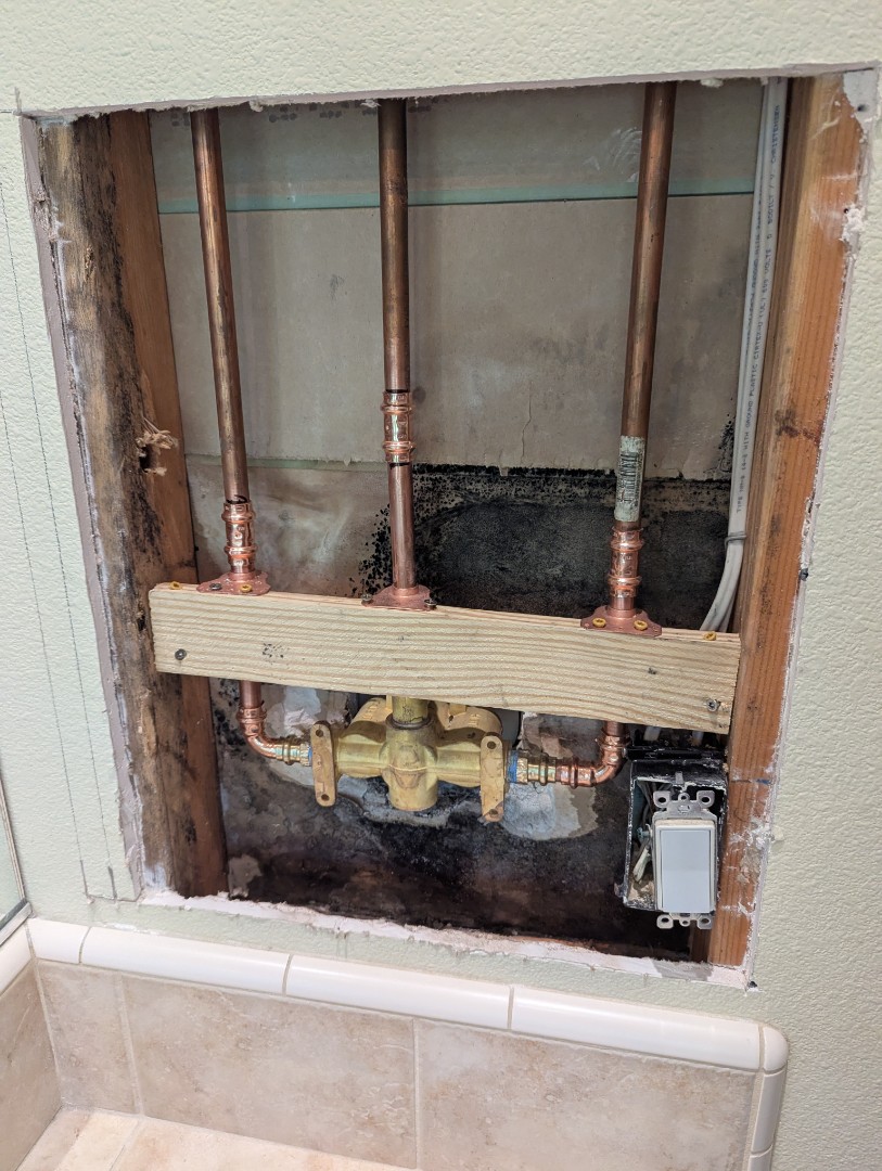 installation of two new cal faucet shower valves and trim. installation of two new cal faucet shower valves and trim.