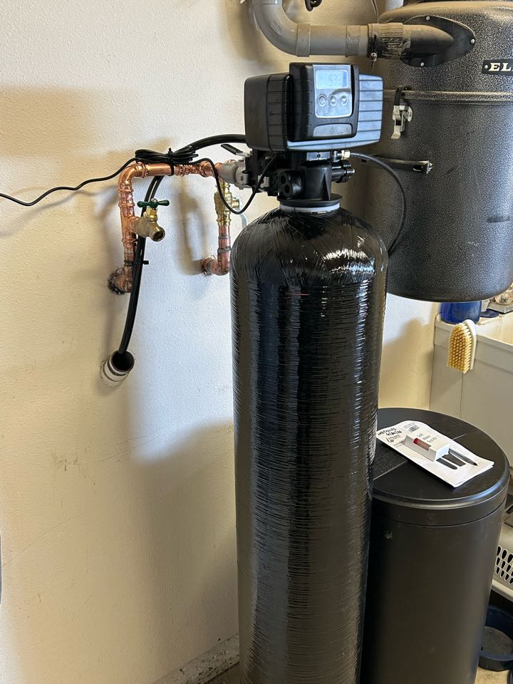Installation of new 1.5 cu ft fleck 5600 sxt soft water system. 