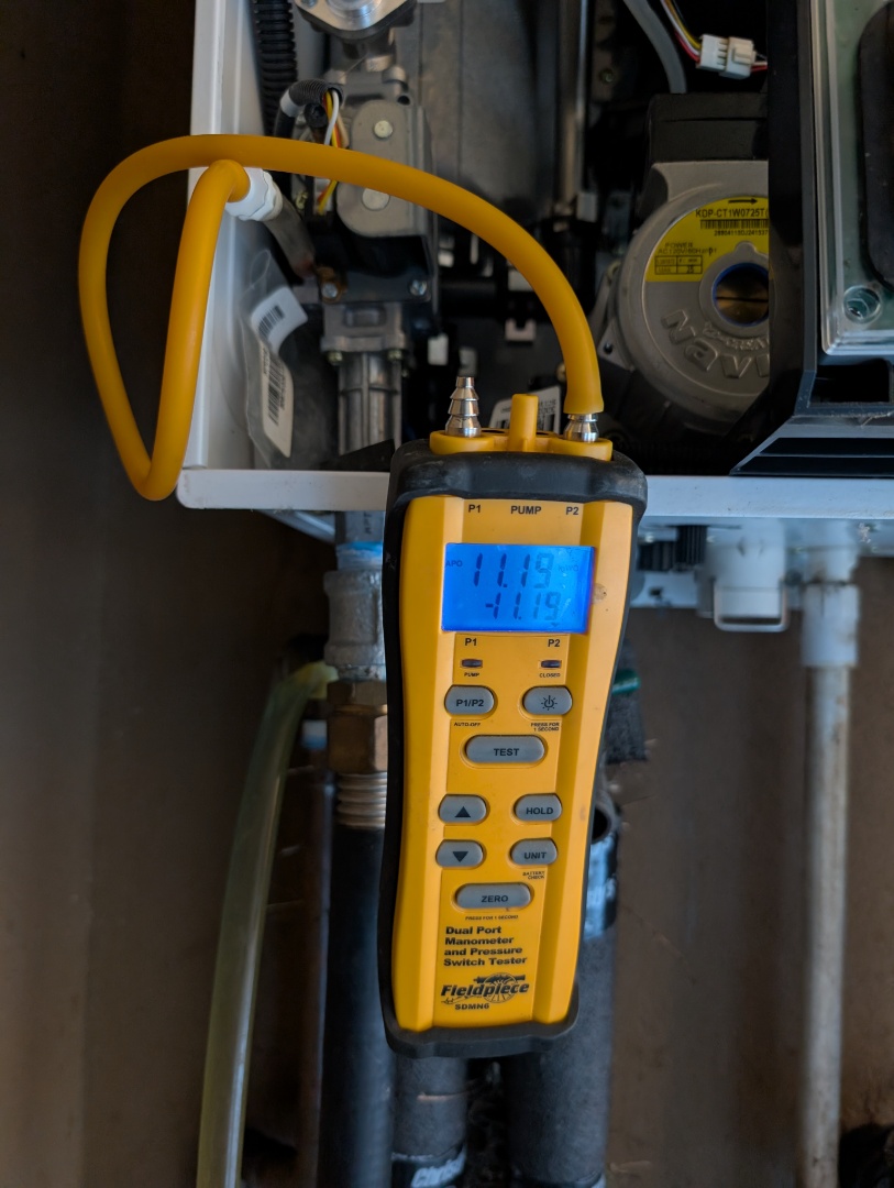 Performed annual maintenance on a Navien NPE240a tankless water heater in Templeton.  