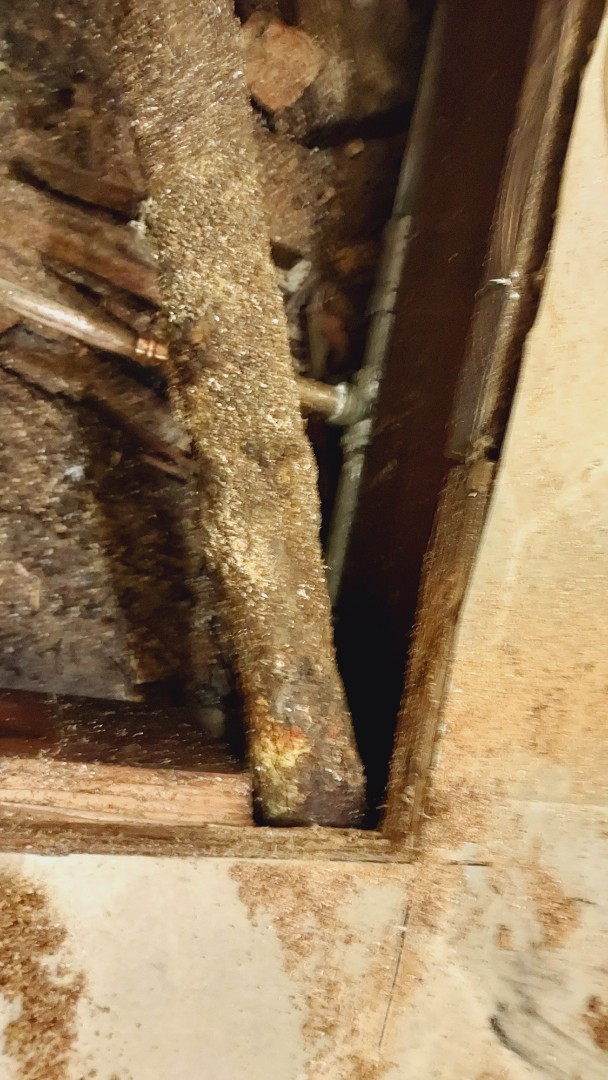 Remove vanity to repair water system leak under floor