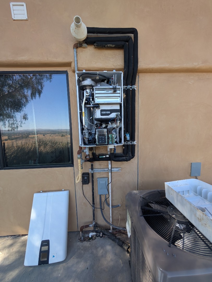 inspected a Navien NPE240a2 tankless water heater in Creston.