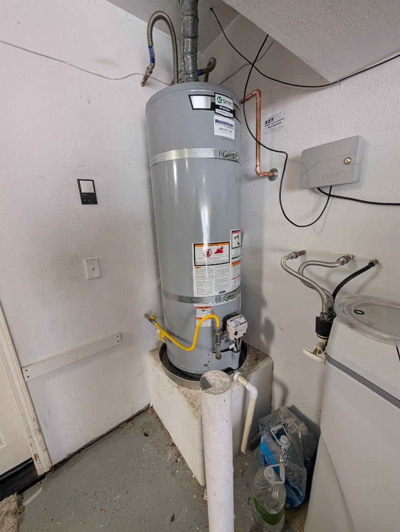 Replaced a leaking 40 gallon natural gas water heater in a garage in Paso Robles.  