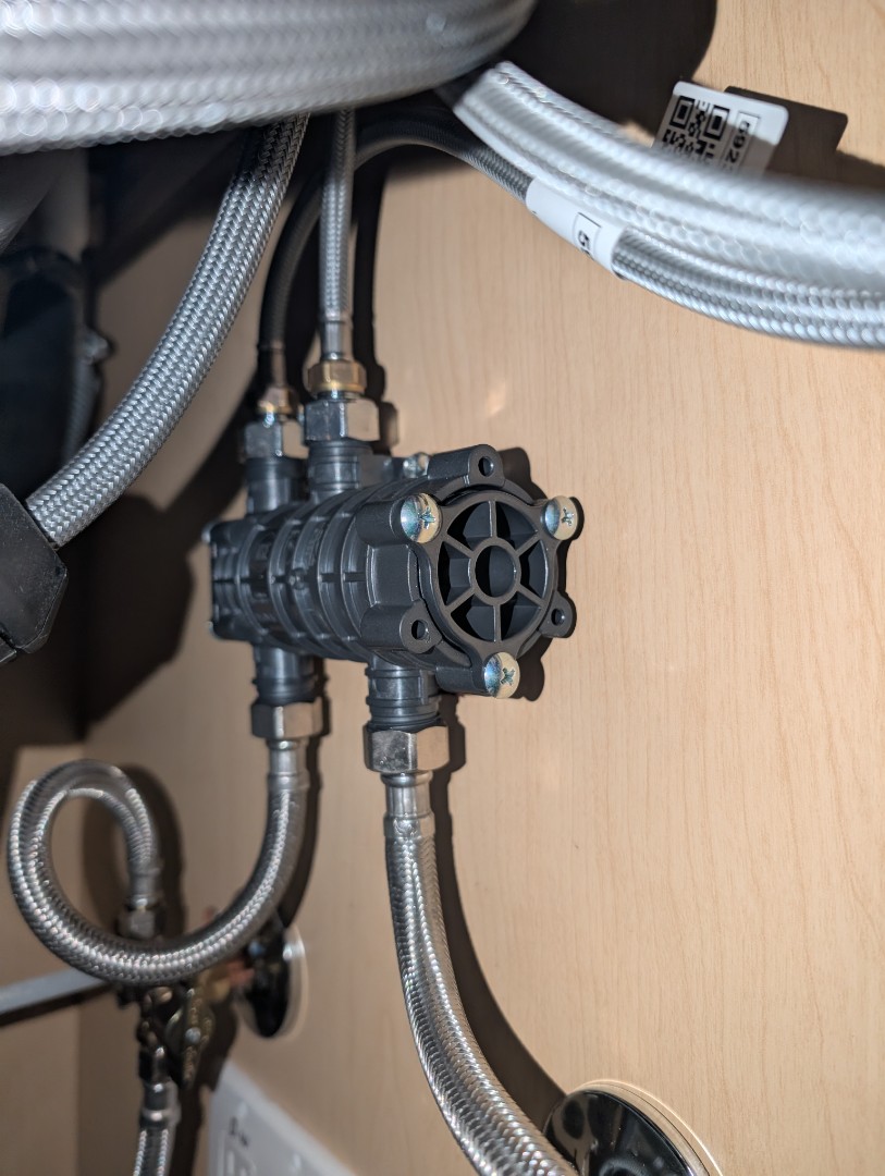 Replaced a faulty and noisy Navien Navicirc crossover valve in Paso Robles.  