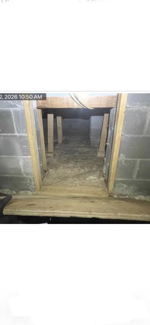 I constructed a custom access door in the crawlspace, ensuring it was airtight to prevent humidity. This improved ventilation and accessibility for the customer.