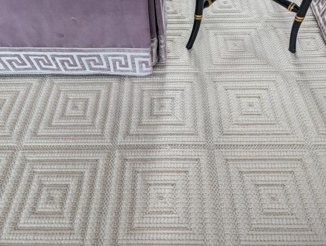 Cocktail sauce stain removal on a custom ivory wool rug at a home in Glenview, KY.