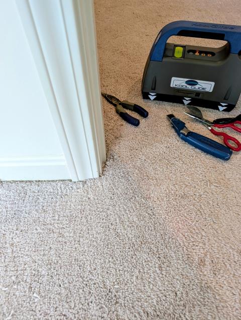 We skillfully repaired a hole in the bedroom carpet caused by a playful dog. Our expert team saved the family thousands by restoring the damaged area instead of replacing the entire carpet. The Kool Glide seam iron and a few of our favorite Crain repair tools, and thousands of previous repairs, made this one seem like a piece of cake. 