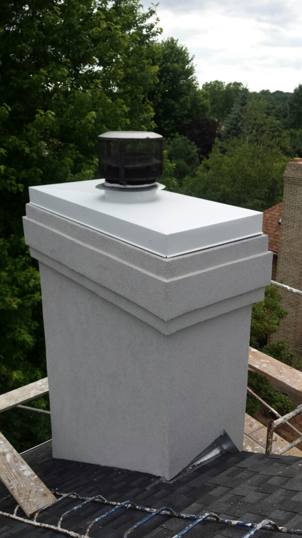 Saint Paul, MN - Fabricated and installed new 24 gauge Steel Chimney Cap primed and painted to match trim on home. Saint Paul, MN - Fabricated and installed new 24 gauge Steel Chimney Cap primed and painted to match trim on home.