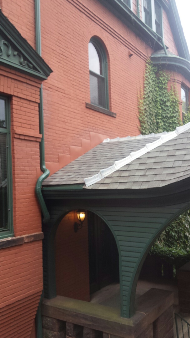 Saint Paul, MN - Repairing leaks by Tuckpointing, reflashing, reshingling and installing new downspout. Saint Paul, MN - Repairing leaks by Tuckpointing, reflashing, reshingling and installing new downspout.