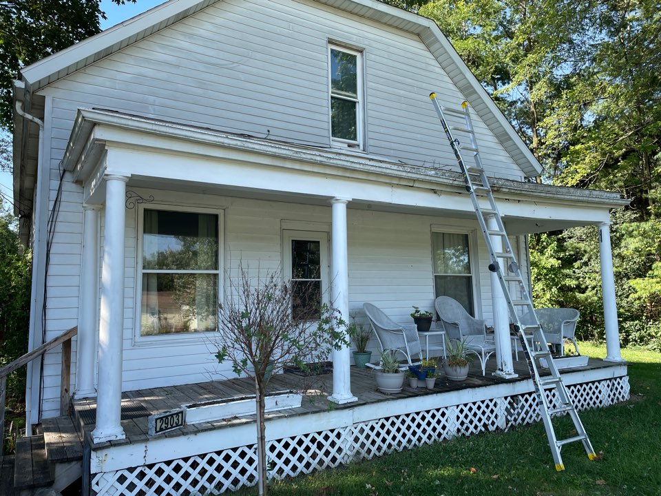 Free estimate to replace an old leaking roof on a front porch in Springfield, Ohio.